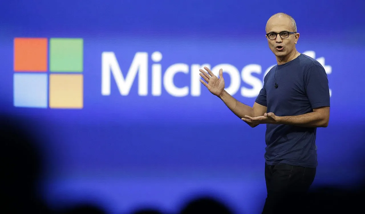 Logotipo da Microsoft ao fundo enquanto texto na tela exibe alertas sobre riscos de sistemas de inteligência artificial sem controle independente